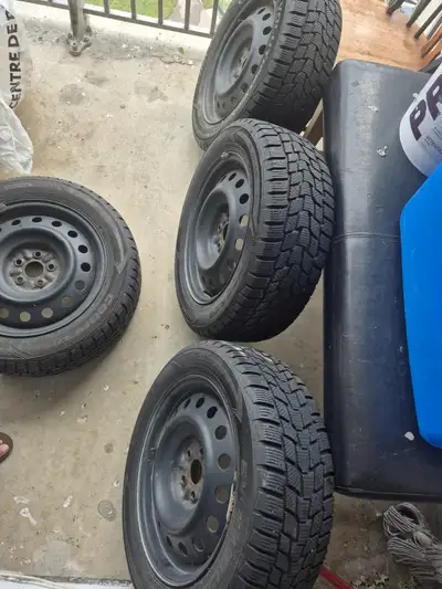 Set of 4 Cooper winter tires on steel rims 205/55/R16 used on Toyota corolla.