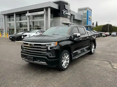 The 2023 Chevrolet Silverado 1500 High Country is an impressive black 4x4 truck that combines power...