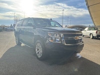 This Chevrolet Suburban boasts a Gas V8 5.3L/325 engine powering this Automatic transmission. Wipers... (image 5)