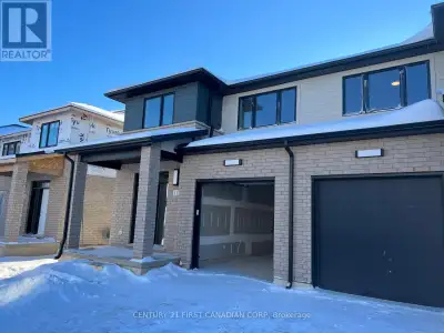 Buyers, listen up! This stunning 1,795 sq. ft. townhome is the perfect mix of modern design, everyda...