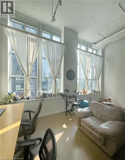 Bright, stylish loft just steps from Google and University of Waterloo School of Pharmacy in Kitchen...