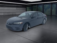The 2024 Honda Civic Sedan LX-B CVT in sophisticated gray combines front-wheel drive with precise ha... (image 3)
