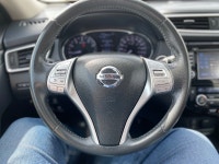 Experience confident all-weather driving and smart technology integration with this 2015 Nissan Rogu... (image 3)