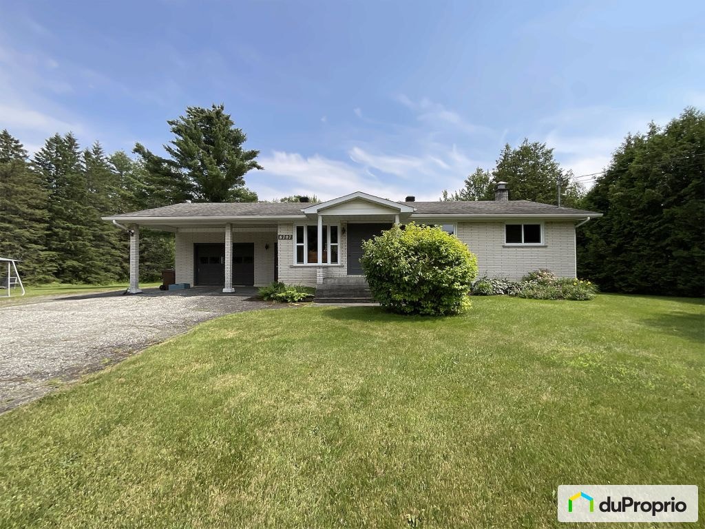 $849,000 - Bungalow for sale in Sherbrooke (St-Élie-d'Orford) — photo 1
