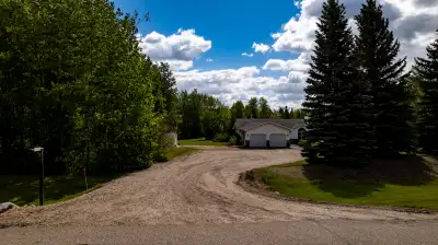 Best of both worlds, city convenience and acreage living! Private 2.11 acre setting surrounds this c...