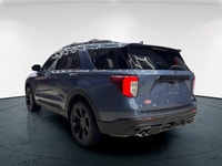 The 2021 Ford Explorer ST in striking blue is a 44 SUV that offers an impressive blend of power and... (image 4)
