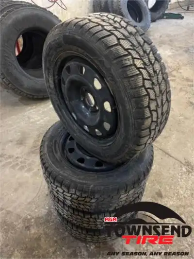 SET OF FOUR USED HERCULES AVALANCE RT WINTER TIRES ON BLACK STEEL RIMS FOR A DODGE DART 215/55R16, T...