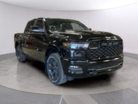 The 2026 Ram 1500 Big Horn 4x4 Crew Cab 57 Box comes in a striking Diamond Black Crystal Pearl finis... (image 6)