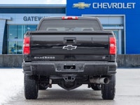 The 2017 Chevrolet Silverado 2500HD LT commands attention with a rugged, purposeful silhouette that... (image 6)