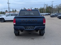 The pre-owned 2021 Ram 1500 Classic Express Crew Cab in Patriot Blue Pearl with a Black and Diesel G... (image 4)