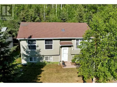 This charming home offers great curb appeal with recently updated windows, facia, soffit, gutters an...