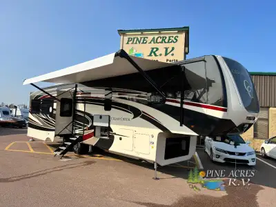 Forest River Cedar Creek fifth wheel 377BH highlights: Two Bedrooms Champagne Edition Full Paint Rea...