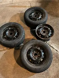 225-60-16 Firestone Winterforce tires on steel rims