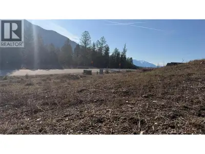This exceptional 11,804 sq. ft. lot offers stunning Rocky Mountain views and is ideally positioned a...