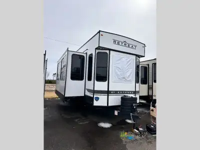 Keystone Retreat destination trailer 391FSRL highlights: Private Rear Bedroom with 2 Lofts on the 2n...