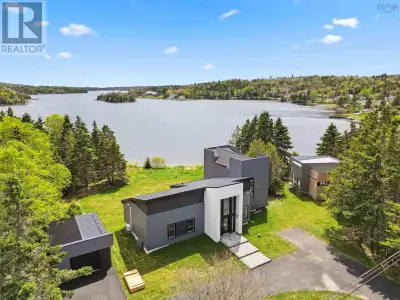 RARE OPPORTUNITY - Discover an unparalleled coastal lifestyle with this 1.1-acre waterfront property...