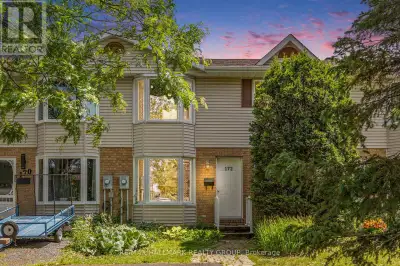 Stunning 3 bed 2 bath townhome with no rear neighbors in an exceptional family oriented community. E...