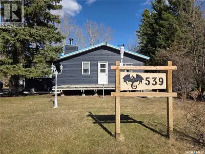 Welcome to your perfect year-round retreat at the lake, where comfort meets rustic charm. Located ne...