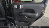The 2022 Jeep Wrangler Unlimited Sahara is a versatile 4-door SUV that blends classic Jeep off-road... (image 9)