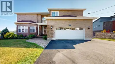 Stunning Hilltop Home with access and Panoramic Views of the Saint John River. Perched atop a scenic...