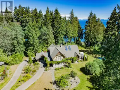 Walk the grounds of this private 8 acre oceanfront estate. Follow winding trails past towering firs...