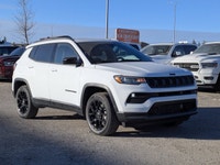 This Jeep Compass has a strong Intercooled Turbo Regular Unleaded I-4 2.0 L/122 engine powering this... (image 1)