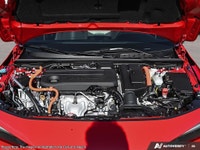 The 2025 Honda Civic Sedan Hybrid Sport eCVT is a standout choice with its vibrant red exterior and... (image 5)