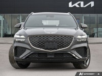 Experience elevated driving in the captivating 2024 Genesis GV70 3.5T Sport, showcasing a sophistica... (image 1)