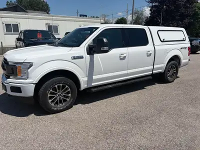 WHITE ON GREY CLOTH, NON SMOKER, NO ACCIDENTS, VERY CLEAN, SERVICE AT FORD DEALER SINCE NEW. MATCHIN...
