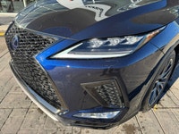 This 2021 Lexus RX 450h is bold and refined, expressing the Lexus design language with a striking fr... (image 5)