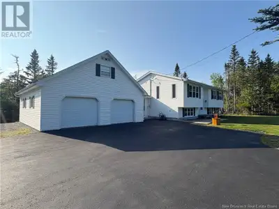 What can I say except wow! This home has can check all the boxes and then some! Privacy, paved drive...
