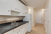 Amenities: Quiet Building • Heat & Water Included • Affordable Parking Suite & Building: One-bedroom... (image 4)