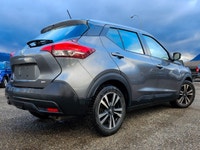 Experience the vibrant 2019 Nissan Kicks in a sophisticated gray finish, complete with a Front-Wheel... (image 1)