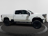 Welcome to Capital GMC! *This 2026 GMC Sierra AT4 2500HD Capital Custom Lifted Truck in Summit White... (image 5)