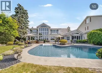 Welcome to a life of unmatched elegance. This waterfront property offers over 5,600 sq ft of luxurio...