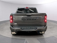 Meet the 2026 Ram 1500 Sport, a robust 4x4 Crew Cab finished in a refined gray exterior. This truck... (image 3)
