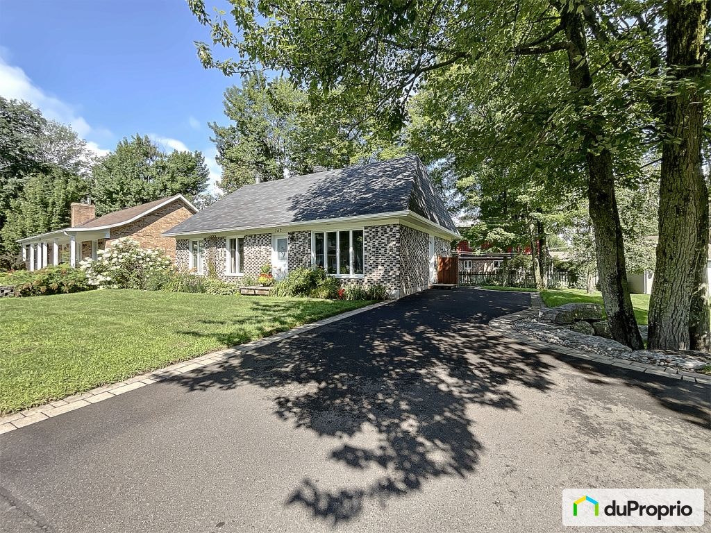 $439,000 - Bungalow for sale in St-Redempteur — photo 1