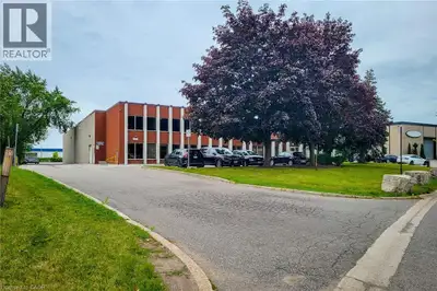 Well-maintained industrial unit featuring 4,970 SF total including a 3,700 SF warehouse and 1,260 SF...