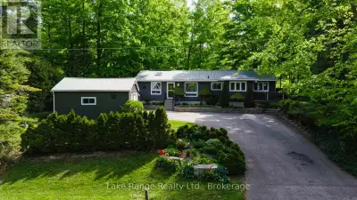 Discover this delightful bungalow nestled on a mature treed, 1/4 acre lot in the picturesque communi...