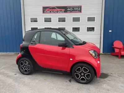 “More than a golf cart” “Since you have to drive between the parking spaces that the Smart was desig...