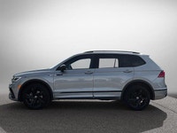 This Volkswagen Tiguan delivers a Intercooled Turbo Regular Unleaded I-4 2.0 L/121 engine powering t... (image 7)