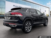 Command the road in this stunning 2023 Volkswagen Atlas Cross Sport Execline, resplendent in Deep Bl... (image 4)