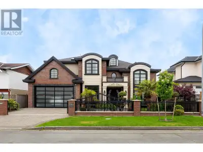 Exceptional luxury residence with rental unit in the prestigious Quilchena, showcasing impeccable de...
