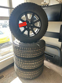 255/70R18 Studded Discoverer M+S snow tires, Jeep Wrangler Rims.