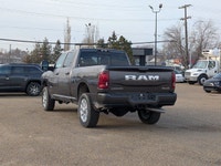 The 2026 Ram 3500 Laramie Crew Cab in Granite Crystal Metallic combines heavy-duty capability with p... (image 3)