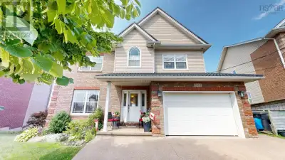 This truly magnificent two storey home with five-bedrooms, three full and one-half bathrooms, is loc...