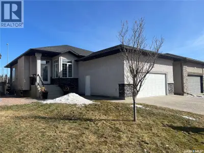 Built in 2011 on one of Harbour Landing’s original crescents, this executive bungalow offers 1,700 s...