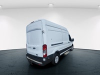 The 2017 Ford Transit Cargo Van in white with an automatic transmission and RWD drivetrain is specif... (image 3)