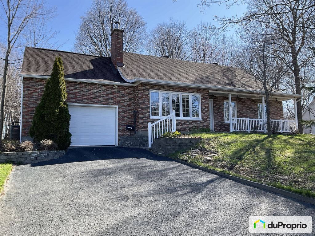 $575,000 - Bungalow for sale in Ile d'Orléans (St-Laurent) — photo 1