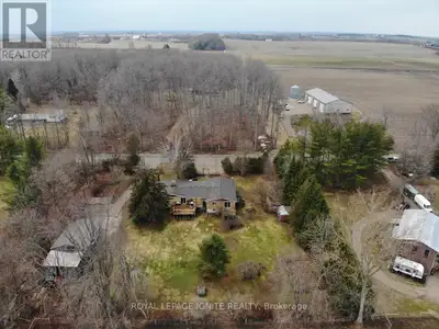 Rare offering of a unique 2 dwelling, super charming bungalow, on a scenic picturesque lot! One addr...
